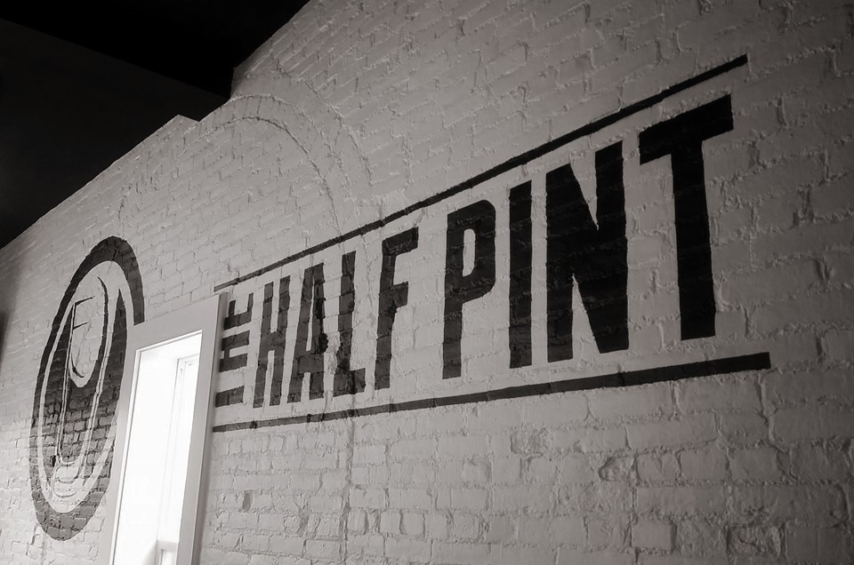 An image of The Half Pint printed on the wall at The Half Pint in Marysville.